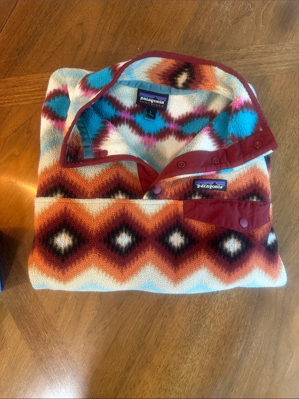 Patagonia Fleece Syncilla Pullover in Rust, Turquoise & Cream Geometric Print